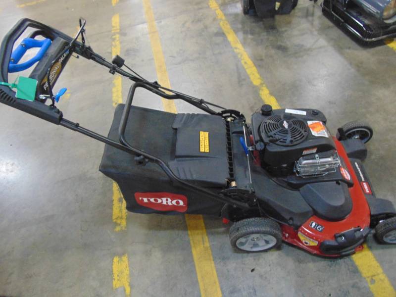 lot 332 image: Toro TimeMaster 30 in. Briggs & Stratton Personal Pace Self-Propelled Walk-Behind Gas Lawn Mower with Spin-Stop 21199