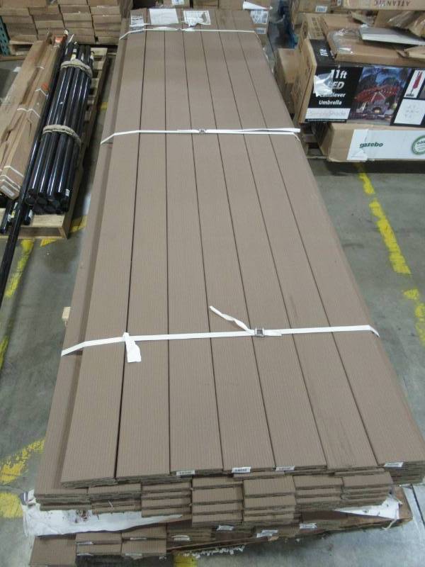 lot 73 image: Style Selections 12-ft Natural Brown Grooved Composite Deck Board 1 x 5 12 x 12 - Approximately 100 boards.