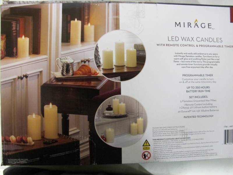 lot 31 image: Mirage 5 LED Wax Candles with Remote Control and Programmable Timer