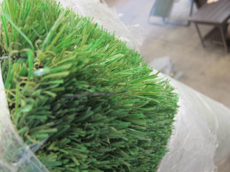 lot 32 image: TrafficMASTER Pet 6 ft. x 7.5 ft. Artificial Grass - 1 Roll