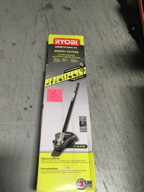 lot 8 image: RYOBI Expand-It 8 in. Brush-Cutter Trimmer Attachment in good condition