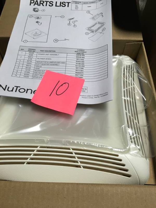 lot 10 image: NuTone 70 CFM Ceiling Bathroom Exhaust Fan with Light, White Grille and Light not used