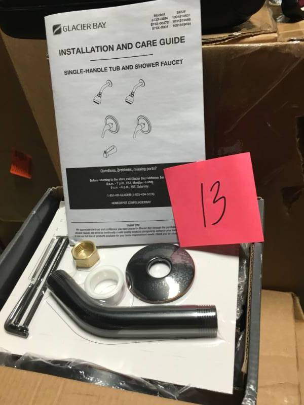 lot 13 image: Glacier Bay Builders Single-Handle 1-Spray Tub and Shower Faucet in Bronze in good condition