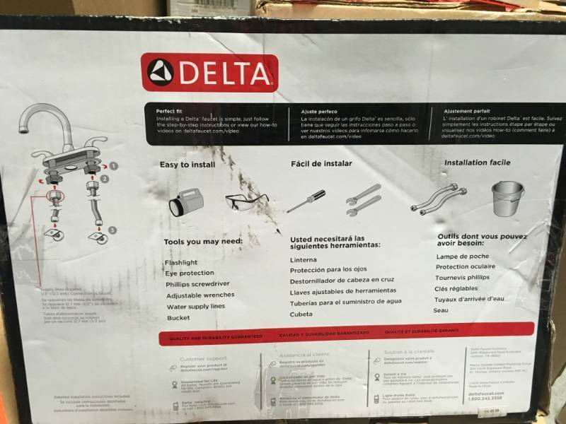 lot 45 image: Delta Foundations 2-Handle Standard Kitchen Faucet with Side Sprayer in Chrome in good condition
