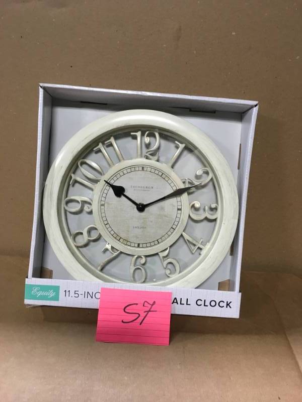 lot 57 image: 11.5 in. Delaney Quartz Antique White Wall Clock by Equity by La Crosse not used