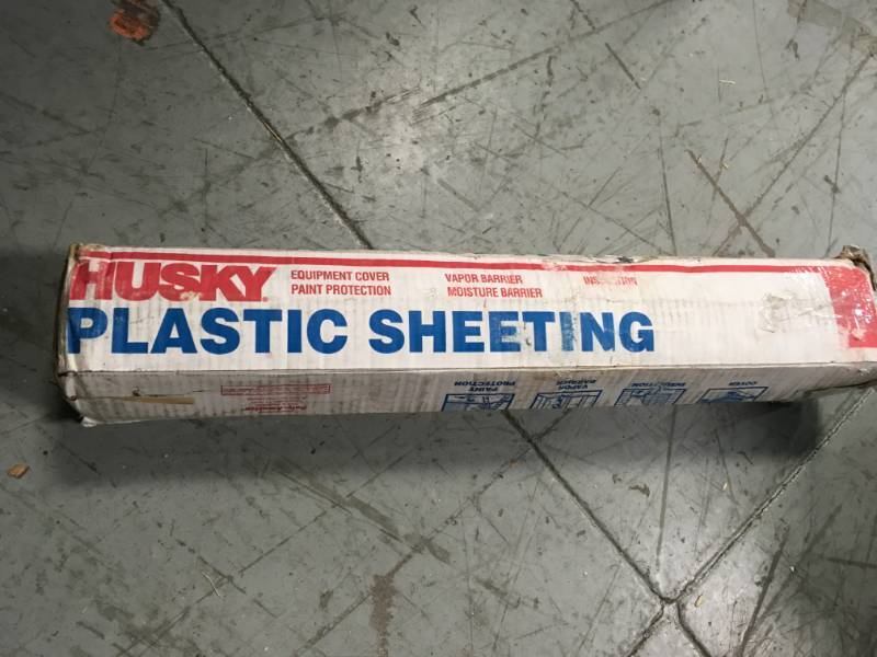 lot 101 image: HUSKY 10 ft. x 50 ft. Clear 6 mil Plastic Sheeting not used
