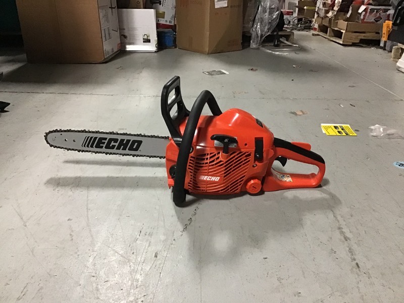 lot 105 image: ECHO 16 in. 30.5 cc Gas 2-Stroke Cycle Chainsaw in working conditions