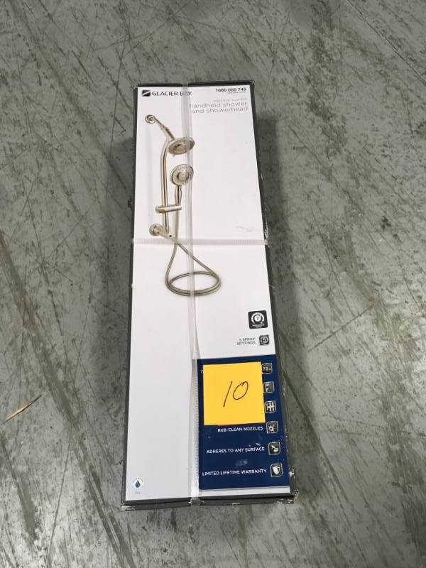lot 10 image: Glacier Bay 5-Spray Wall Bar Shower Kit in Brushed Nickel in good condition