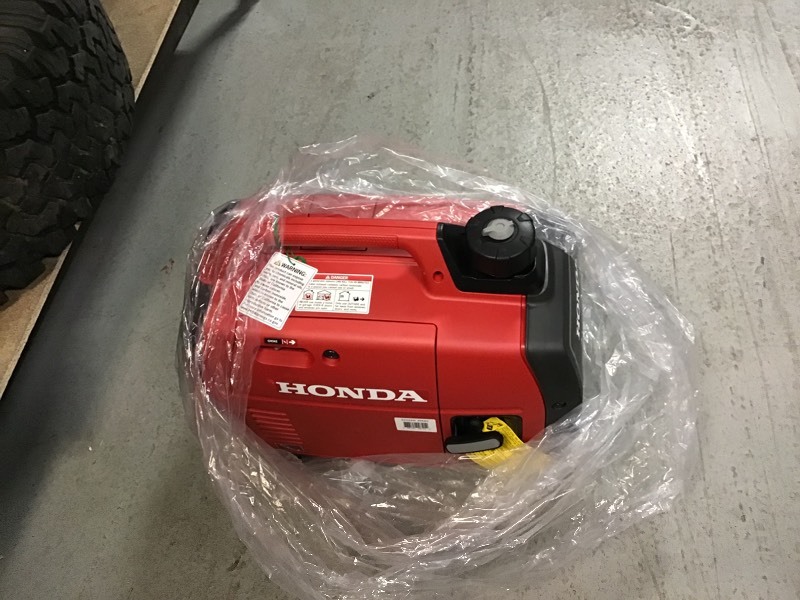 lot 115 image: Honda 2,200-Watt Super Quiet Gasoline Powered Portable Inverter Generator with Eco-Throttle and Oil Alert not used