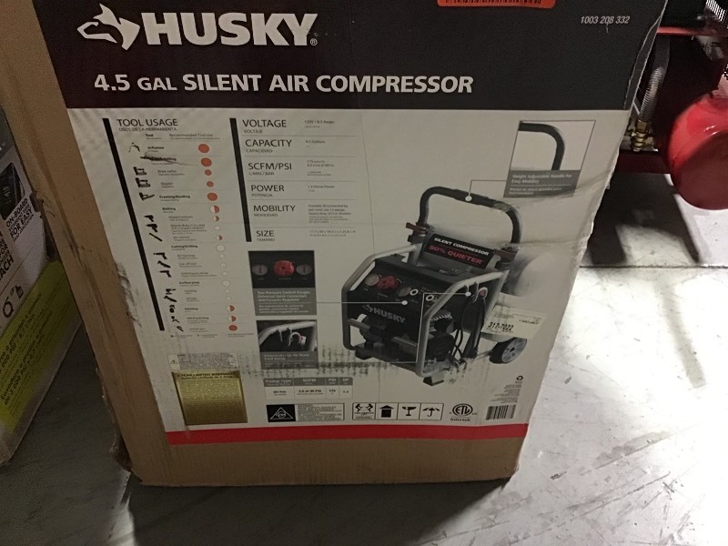 lot 110 image: Husky 4.5 Gal. Portable Electric-Powered Silent Air Compressor not used