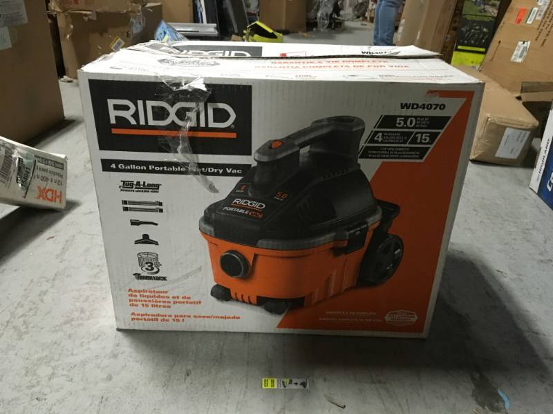 lot 24 image: RIDGID 4 Gal. 5.0-Peak HP Portable WetDry Vacuum USED in working conditions