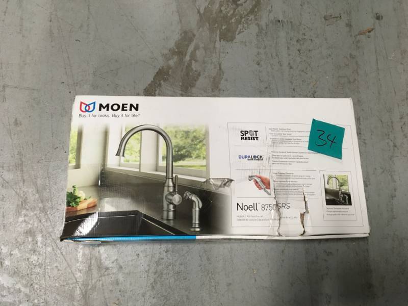 lot 34 image: MOEN Noell Single-Handle Standard Kitchen Faucet with Side Sprayer in Spot Resist Stainless in good conditions