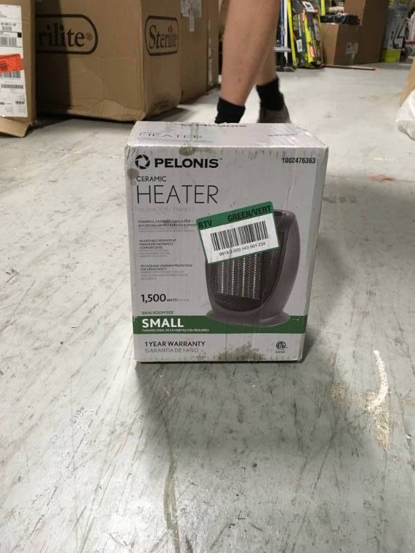 lot 66 image: PELONIS HC-0179 2-Level Ceramic Heater with Adjustable Thermostat by PELONIS in working conditions