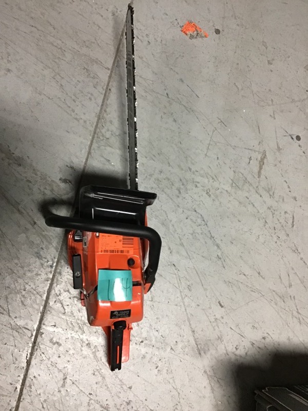 lot 104 image: ECHO 20 in. 59.8 cc Gas 2-Stroke Cycle Chainsaw in working conditions