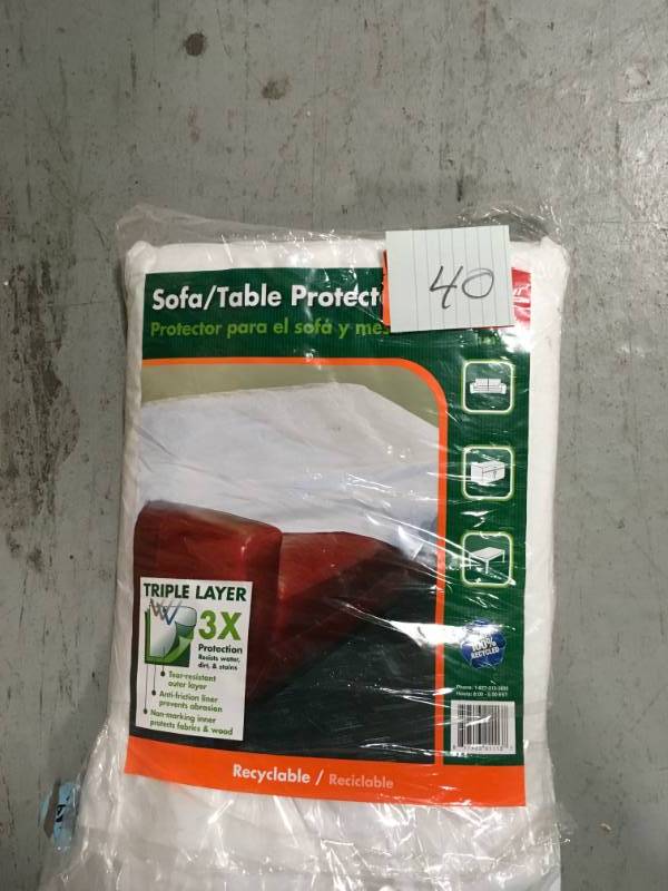 lot 40 image: Pratt Retail Specialties 55 in. W x 135 in. L Sofa or Table Protector in good conditions