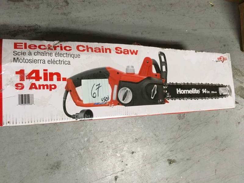 lot 67 image: Homelite 14 in. 9 Amp Electric Chainsaw USED in working conditions