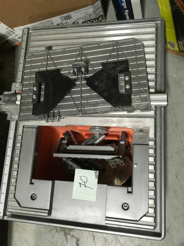 lot 70 image: RIDGID 6.5 Amp Corded 7 in. Table Top Wet Tile Saw USED in working conditions