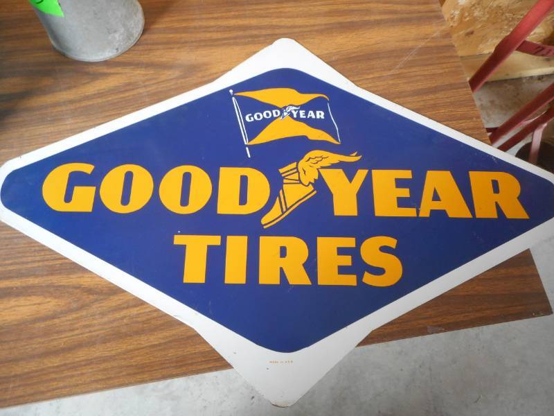 lot 13 image: Goodyear Sign  Old Quart Container