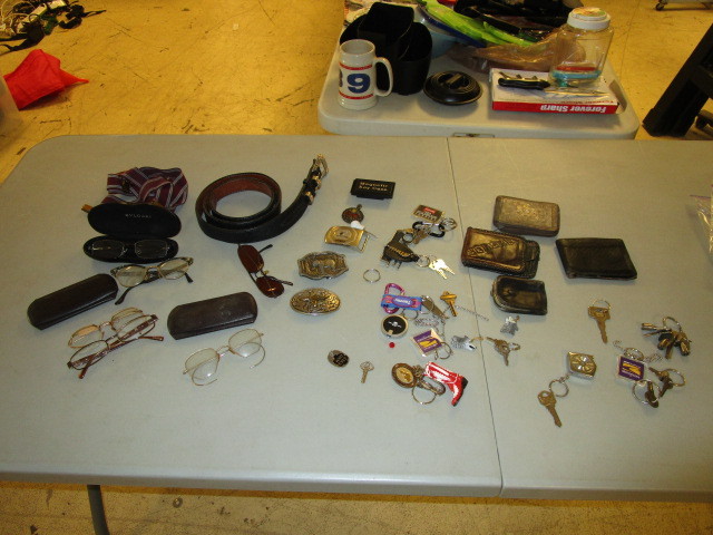lot 404 image: BELT BUCKLES, BELT, KEY CHAINS AND EYE GLASSES
