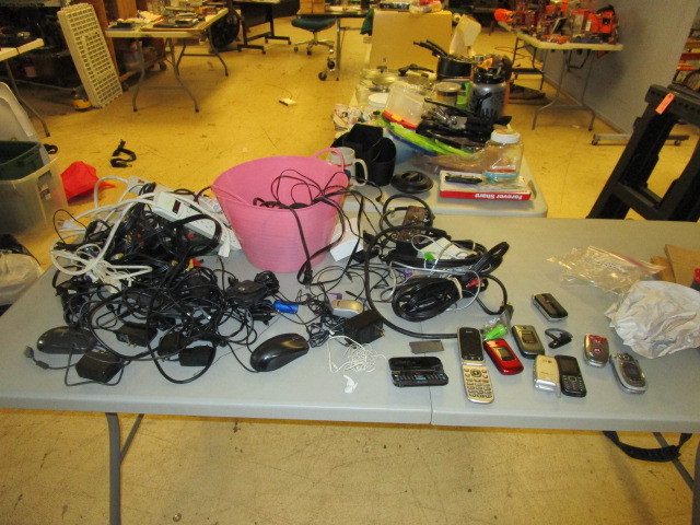 lot 405 image: POWER STRIPS, FLIP PHONES, AND ASSORTED CABLES