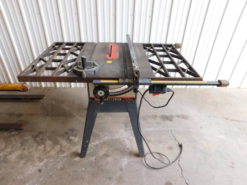 lot 32 image: Craftsmans 10 Table Saw with 12 Table Extensions