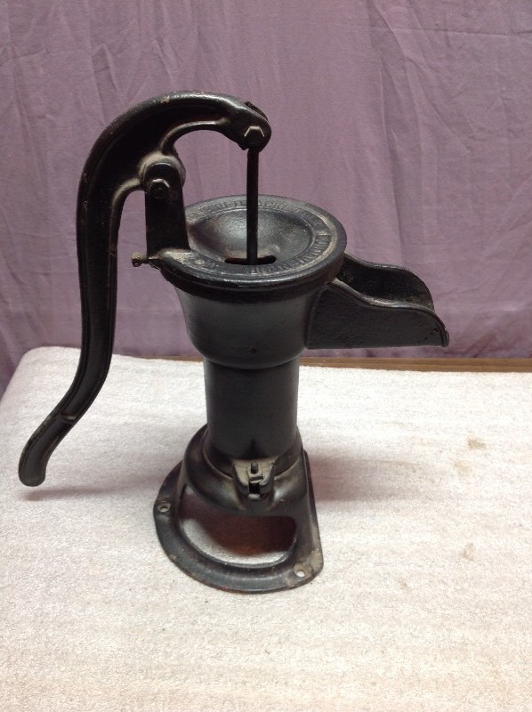 lot 24 image: Decorative Steel Water Pump