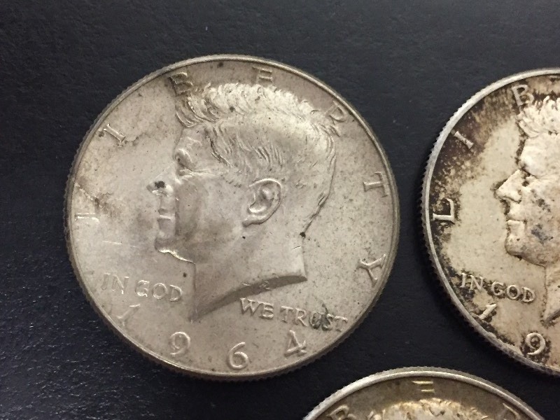 lot 49 image: 3 1964 Kennedy Half Dollars