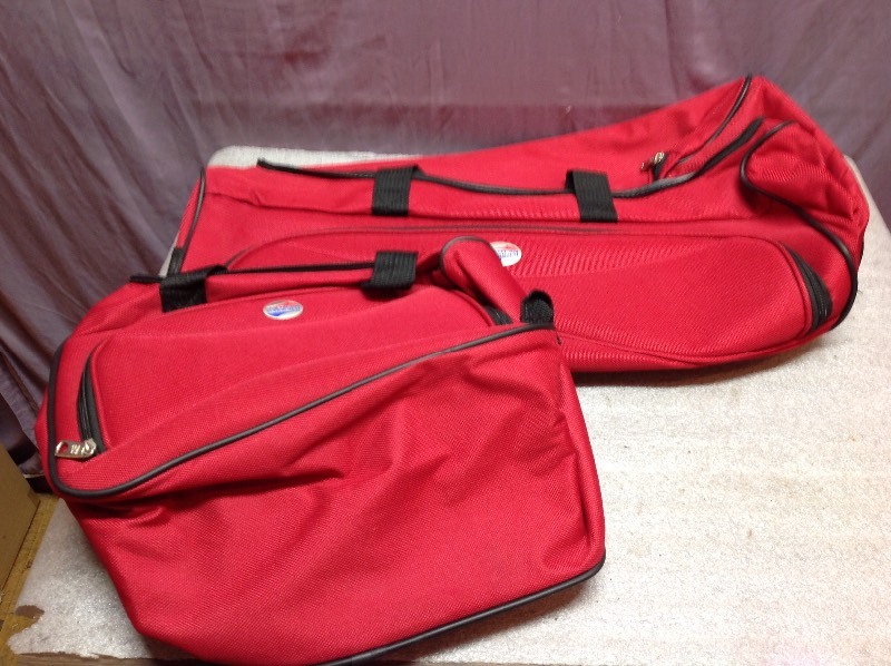 lot 71 image: American Tourister Carry On Bags
