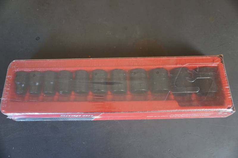 lot 10 image: Snap On Tools Model 3111MYA 11 PC Impact Wrench Socket Set