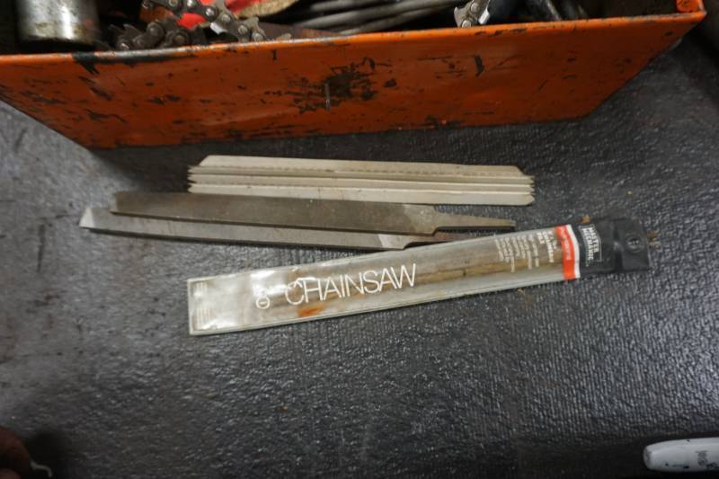 lot 194 image: Chain Saw Lubrication Kit With Tools, Chains, & Metal Storage Case