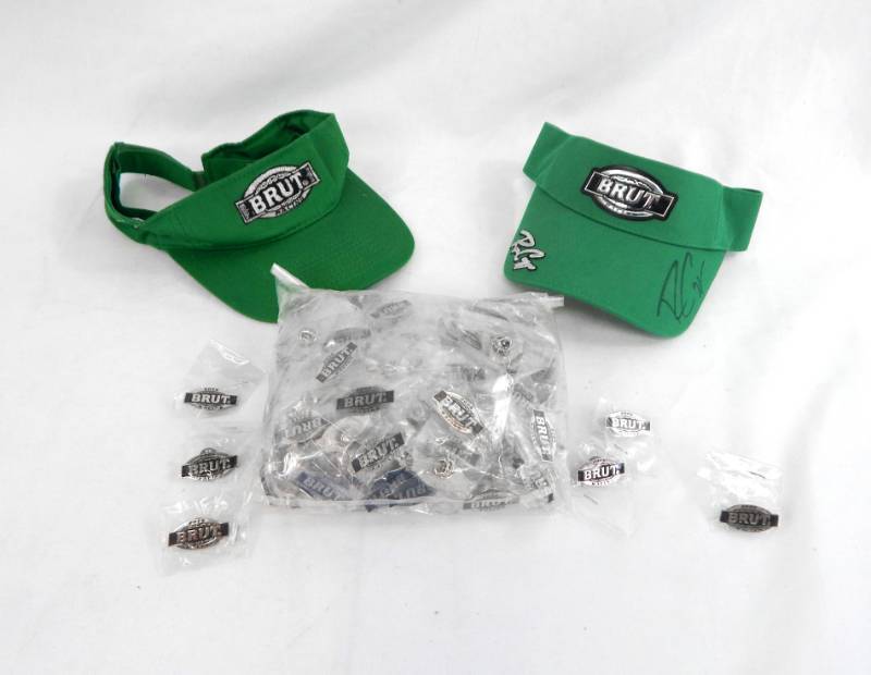 lot 21 image: Lot of Brut Racing Pins, Brut Racing Visors Including Ron Capps Autographed Brut Racing Visor