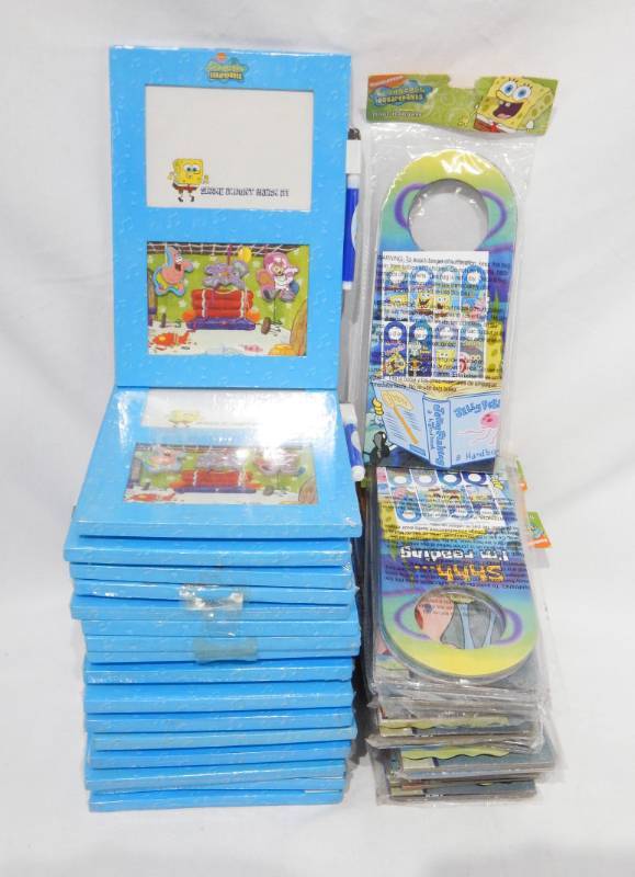 lot 60 image: Lot of New SpongeBob Squarepants Magnetic White Boards and Door Hanger Packs