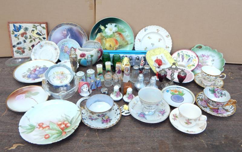 lot 110 image: Large Lot of Salt and Pepper Shakers, Tea Cups, Decorative Plates and Other Housewares