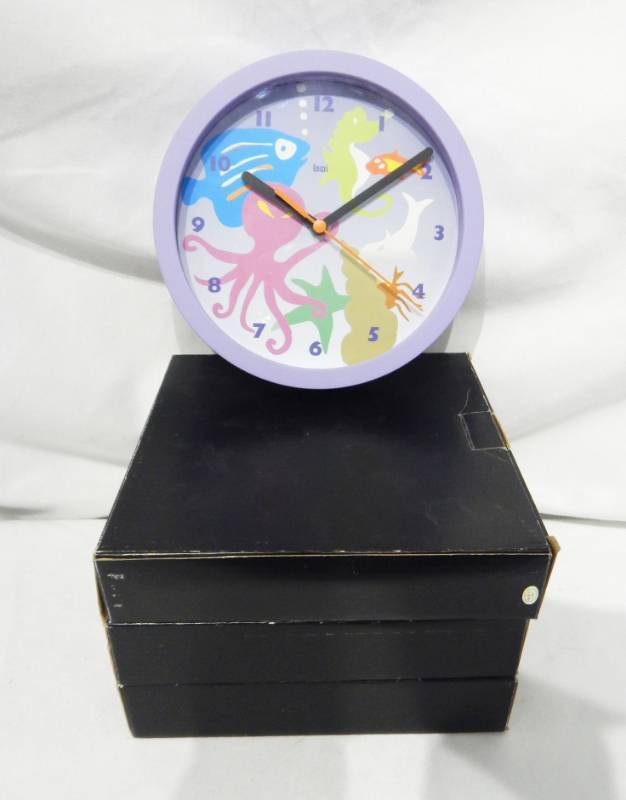 lot 130 image: Bai Aquatic Theme Clock Lot