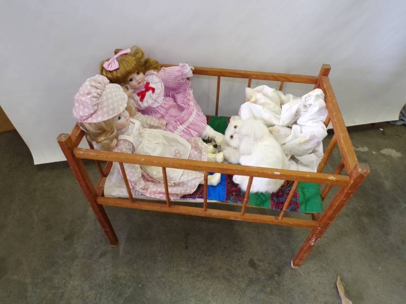 lot 38 image: Pair of Vintage Dolls with Crib