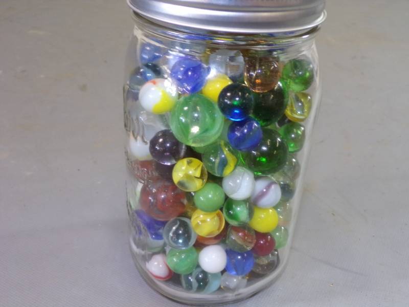 lot 39 image: Ball Jar with Marbles