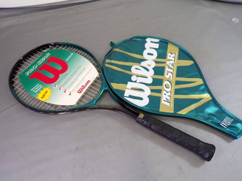 lot 44 image: Tennis Racket with cover