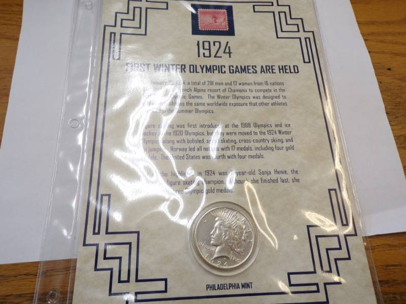 lot 150 image: 1924 First Winter Olympic Games Stamp and 1924 Peace Dollar