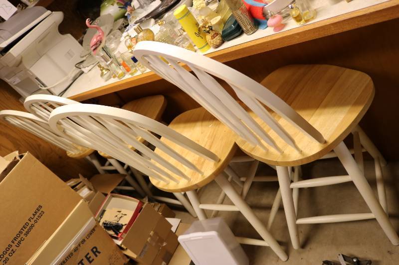 4 matching swivel bar stools...