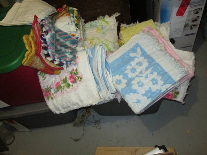 Lot of towels and pot holders - all...