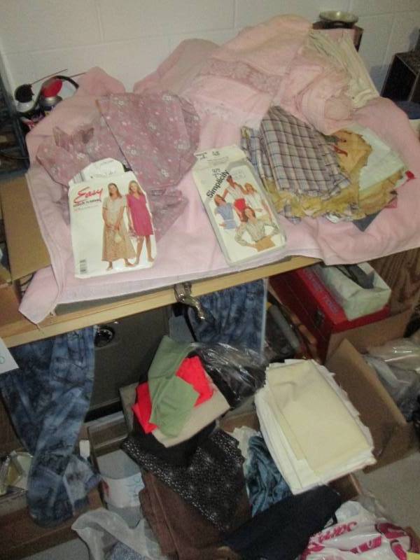 Lot of material and sewing supplies...