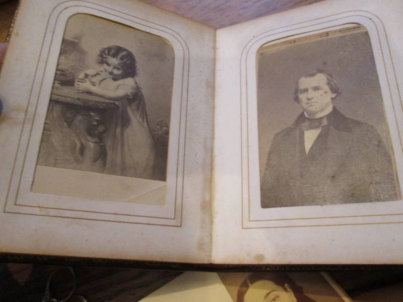 Book of antique photos and 3 rings...