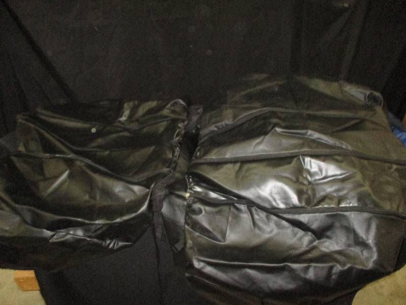 black seat covers, table cloths, blanket, air mattress