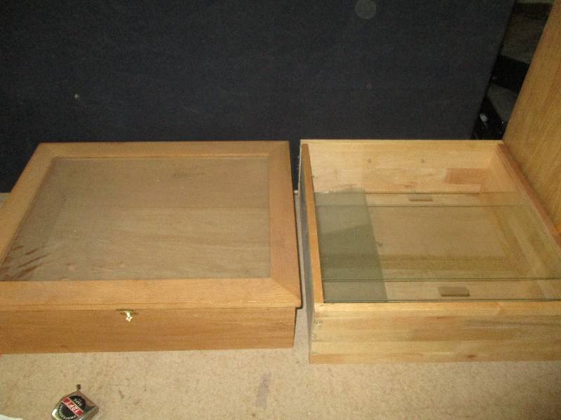 2 display cases 18x 23 x7 inches, and 19x19x7 inche