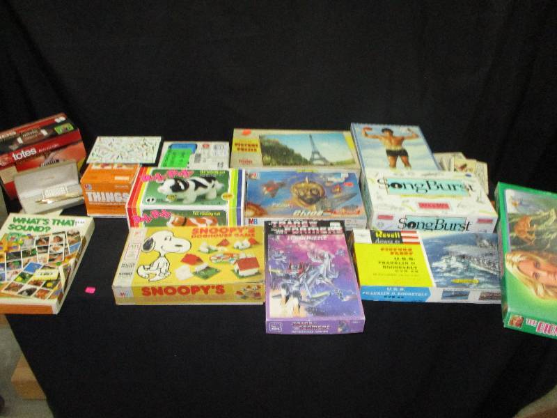 games puzzles, authitic uss rosevelt ship kit, books, foot ball bank,
