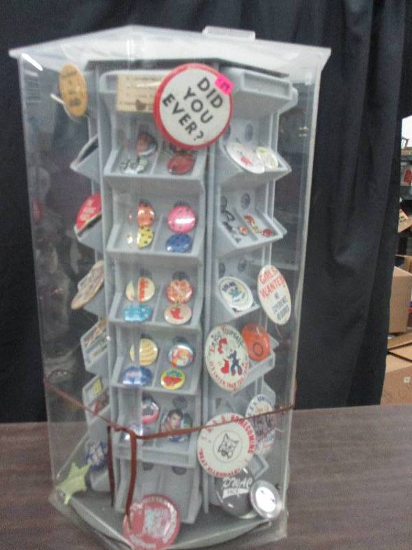 show case full of pins all novilty  and adv