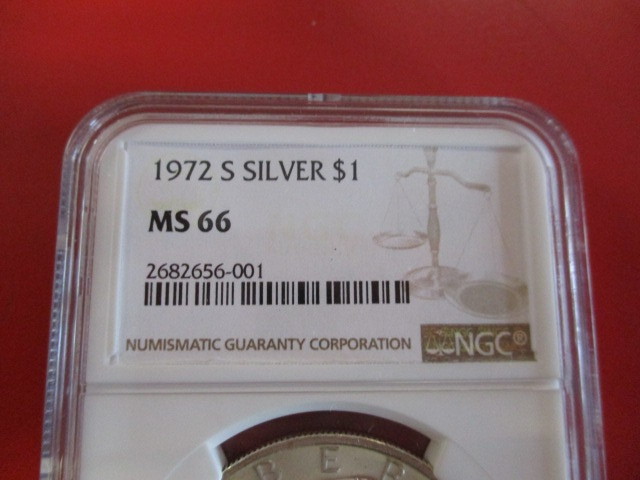 lot 3-4 image: NGC Certified 1972-S (San Francisco Mint) Mint State 66 Silver Eisenhower Dollar. Higher Grade Eisenhower Dollar with certification code for tracking.