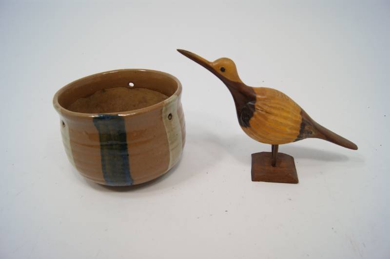 lot 76 image: Wooden Bird Carving with Ceramic Pot