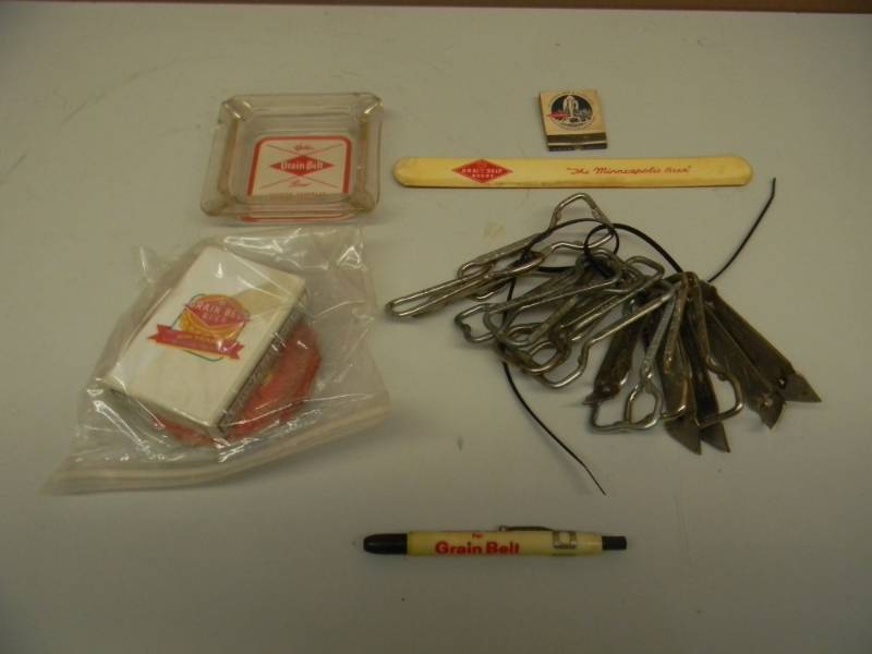 lot 64 image: AWESOME COLLECTION - VINTAGE GRAIN BELT BEER COLLECTION - BEER FOAM SCRAPER, TALKING SCOREBOARD MARKING PENCIL, 16 OPENERS, UNOPENED CARDS, ASHTRAY & MORE  - SEE PICTURES