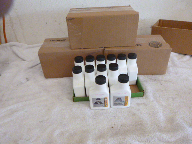 lot 48 image: 4 Cases of Universal 10W30 4-Cycle Oil